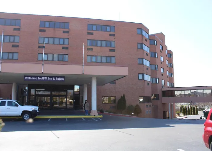 Apm Inn & Suites