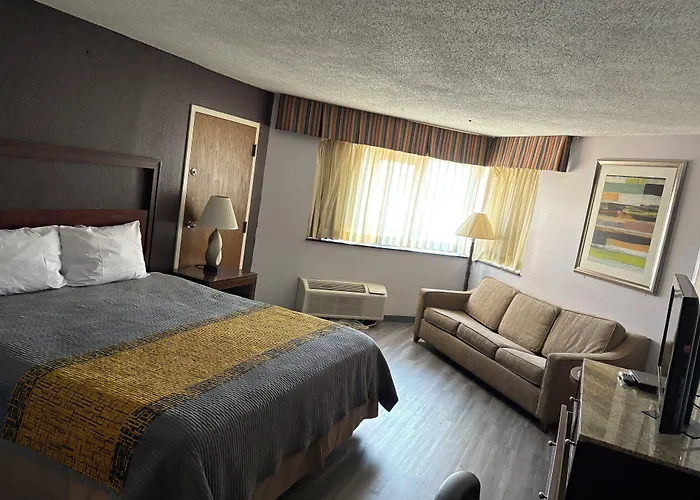 Apm Inn & Suites